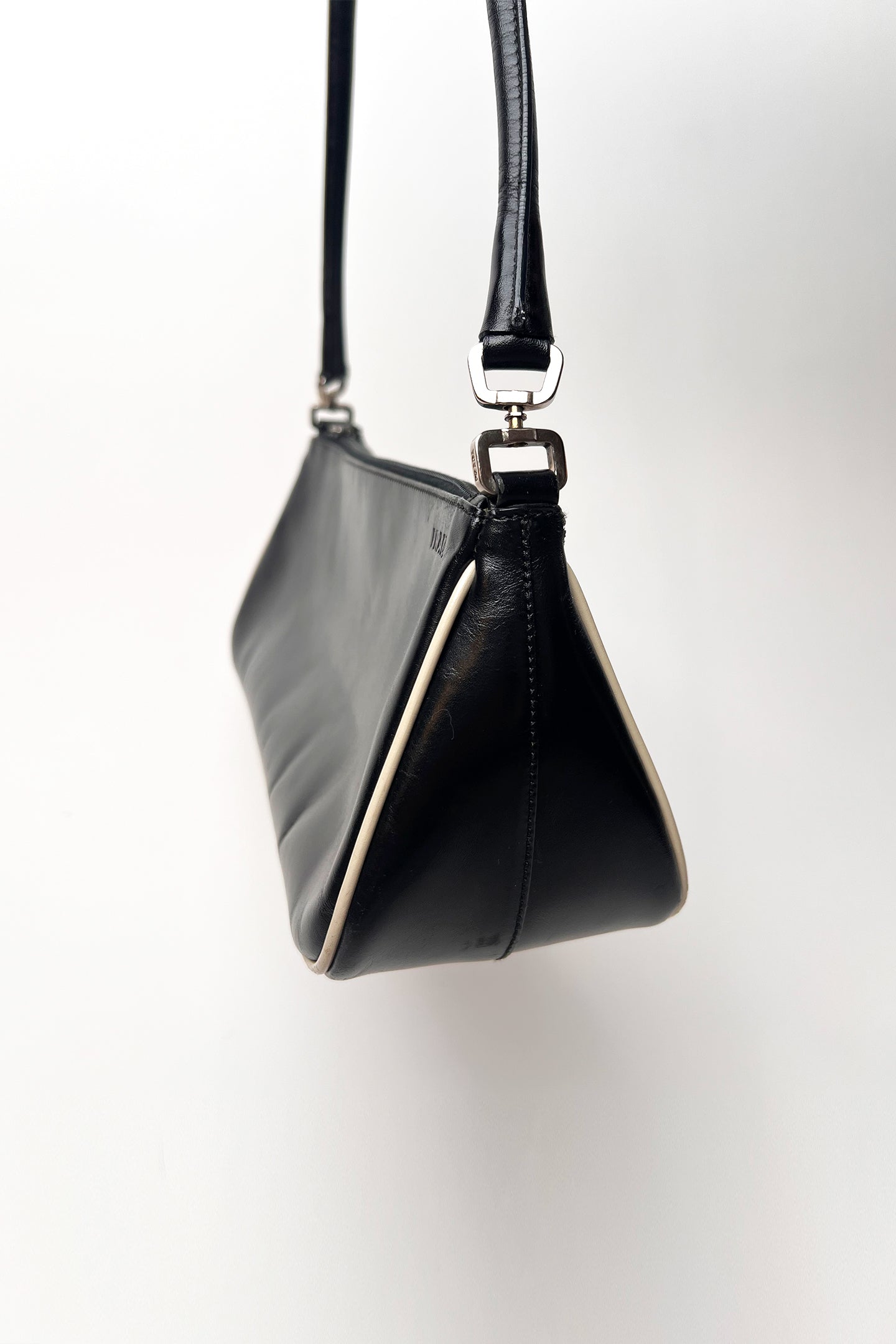 Vintage 2000s black Prada leather shoulder bag with white trims