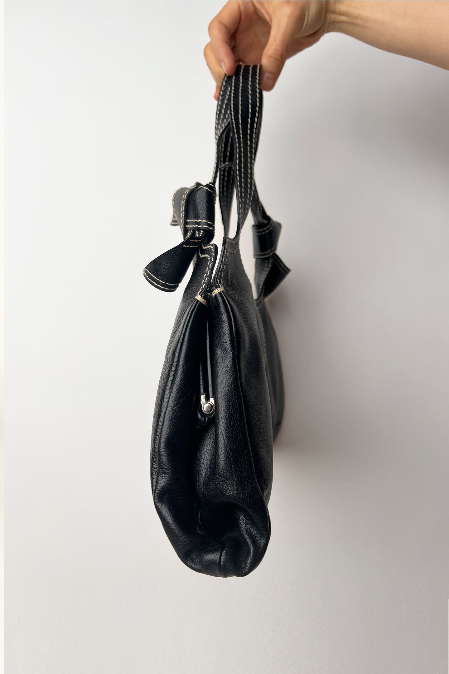 Vintage 90s Rare Miu Miu bow tie black leather shoulder bag with white stitches