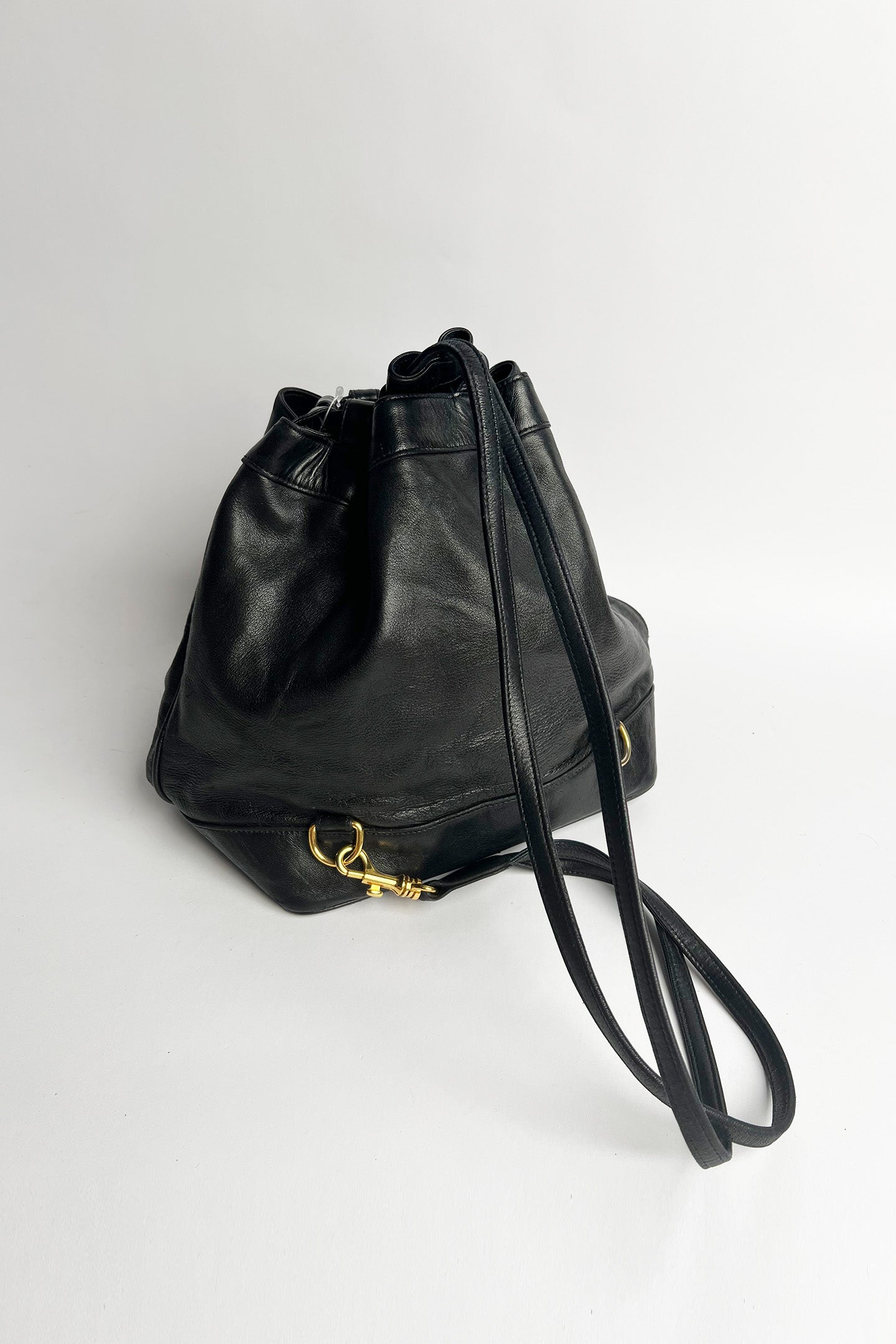 Vintage lamb leather Chanel bucket bag with studded logo
