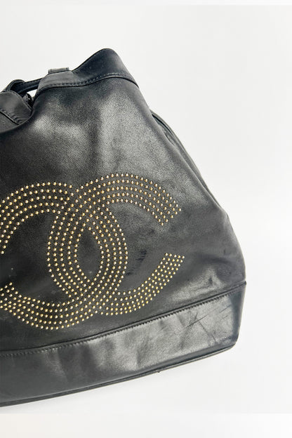 Vintage lamb leather Chanel bucket bag with studded logo