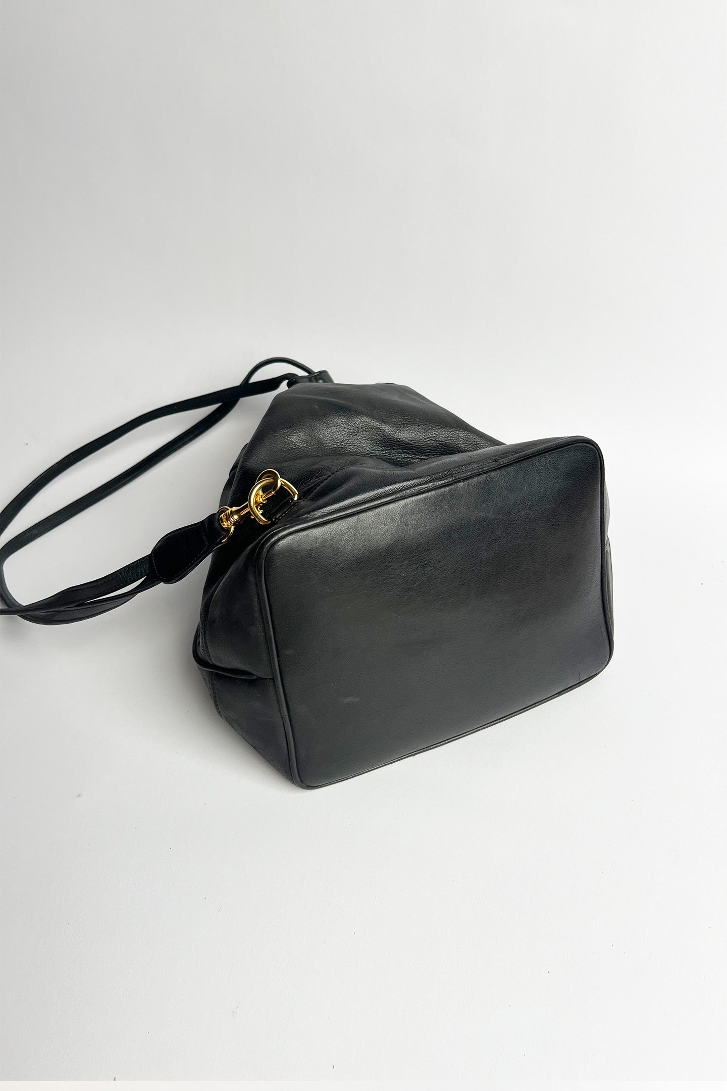Vintage lamb leather Chanel bucket bag with studded logo