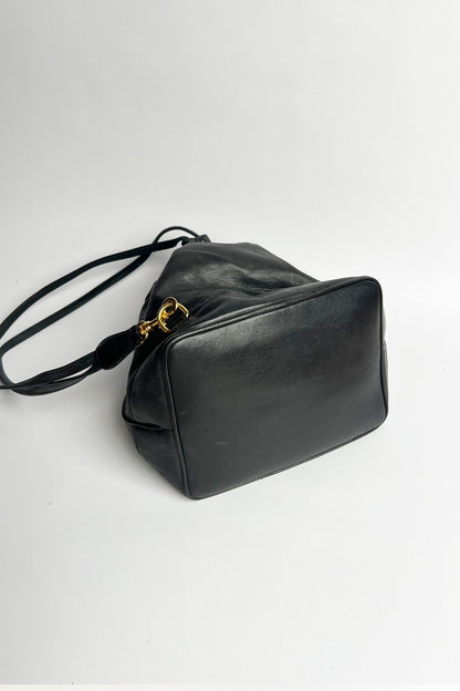 Vintage lamb leather Chanel bucket bag with studded logo