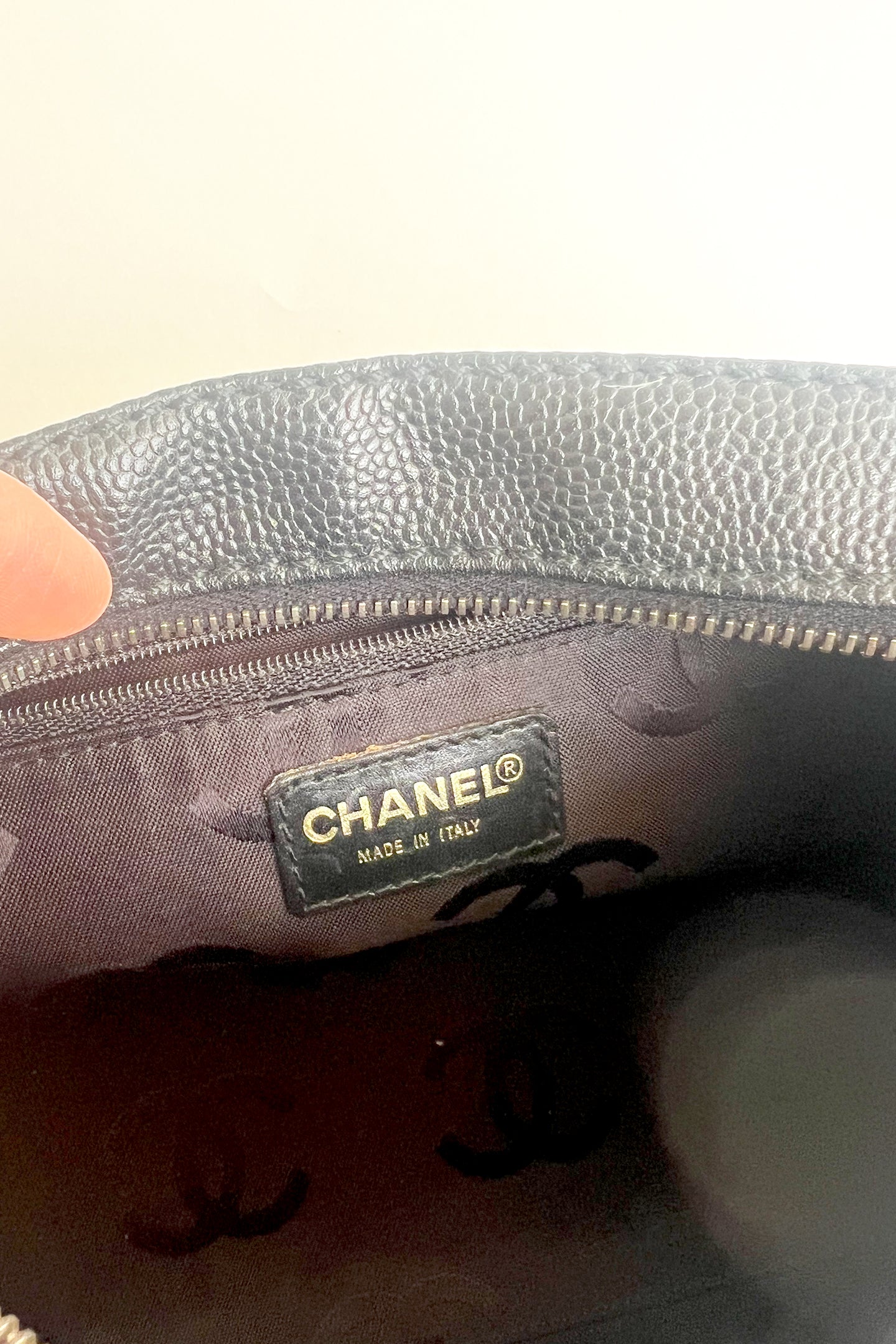 Vintage Chanel black caviar leather shoulder bag with wooden tone hardware