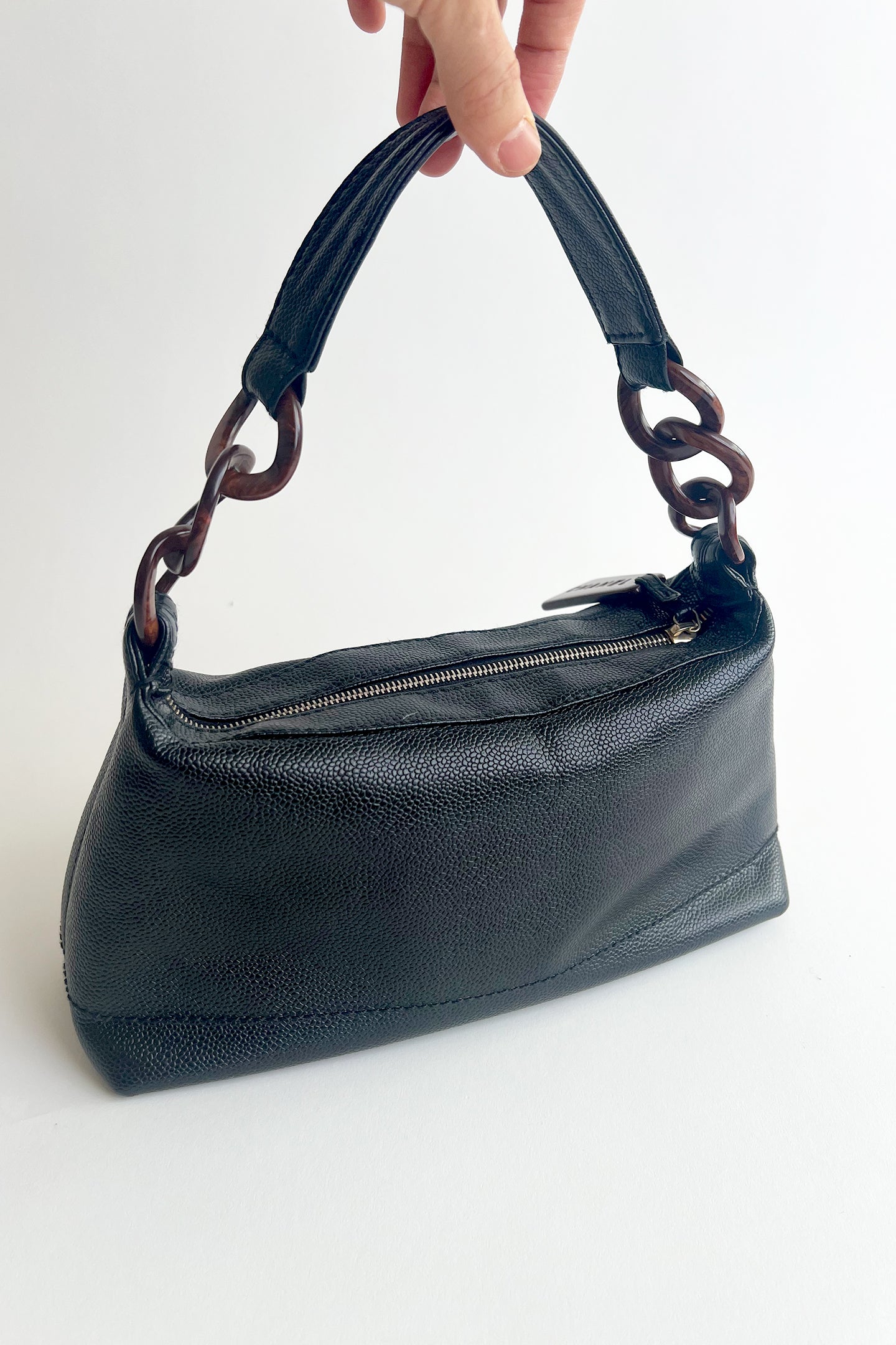 Vintage Chanel black caviar leather shoulder bag with wooden tone hardware