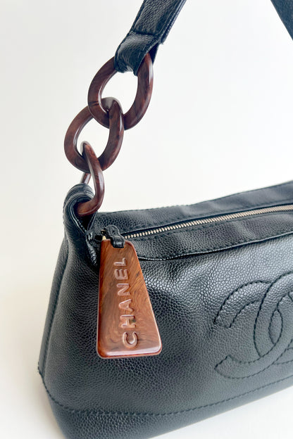 Vintage Chanel black caviar leather shoulder bag with wooden tone hardware