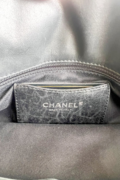 Vintage Chanel black caviar leather shoulder bag with wooden tone hardware