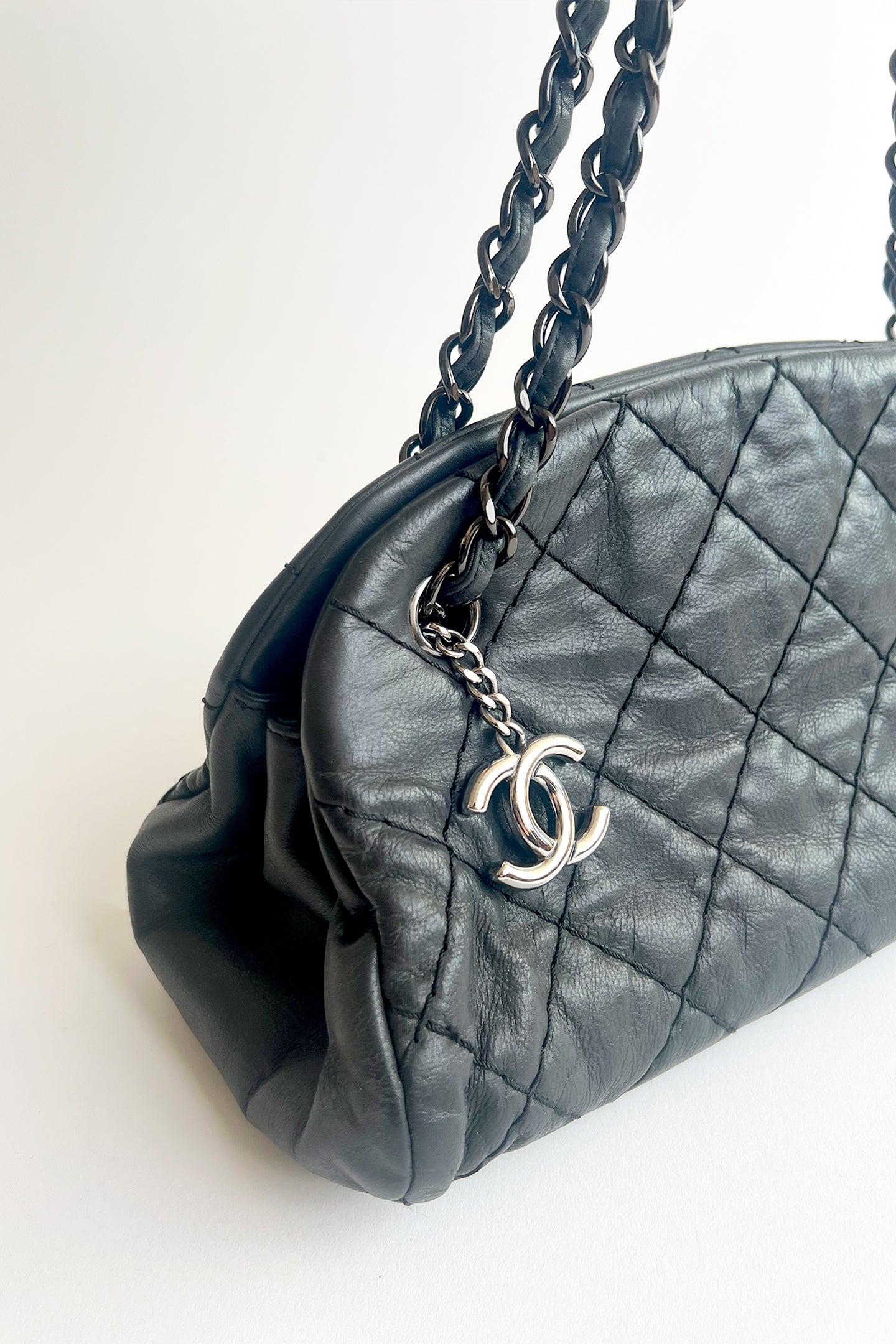 Vintage Chanel black leather wild stitch shoulder bag with metal chain