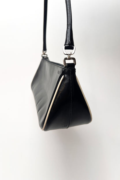 Vintage 2000s black Prada leather shoulder bag with white trims