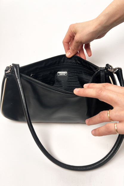 Vintage 2000s black Prada leather shoulder bag with white trims