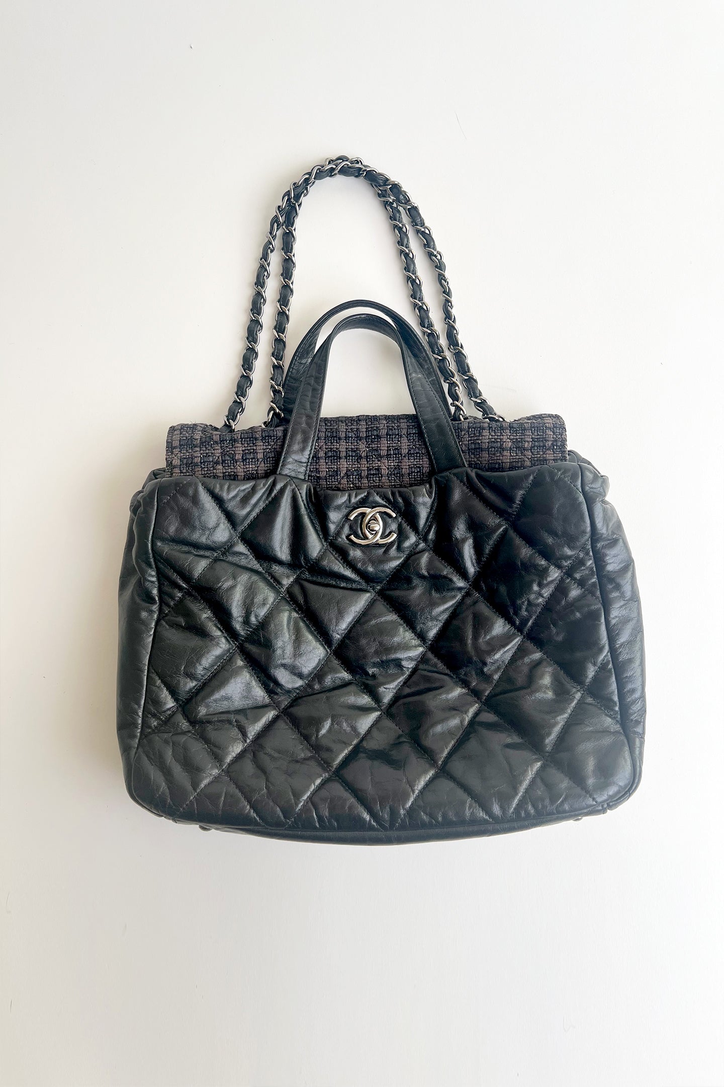 Vintage 2000s Chanel black leather two way tote with tweed flap top