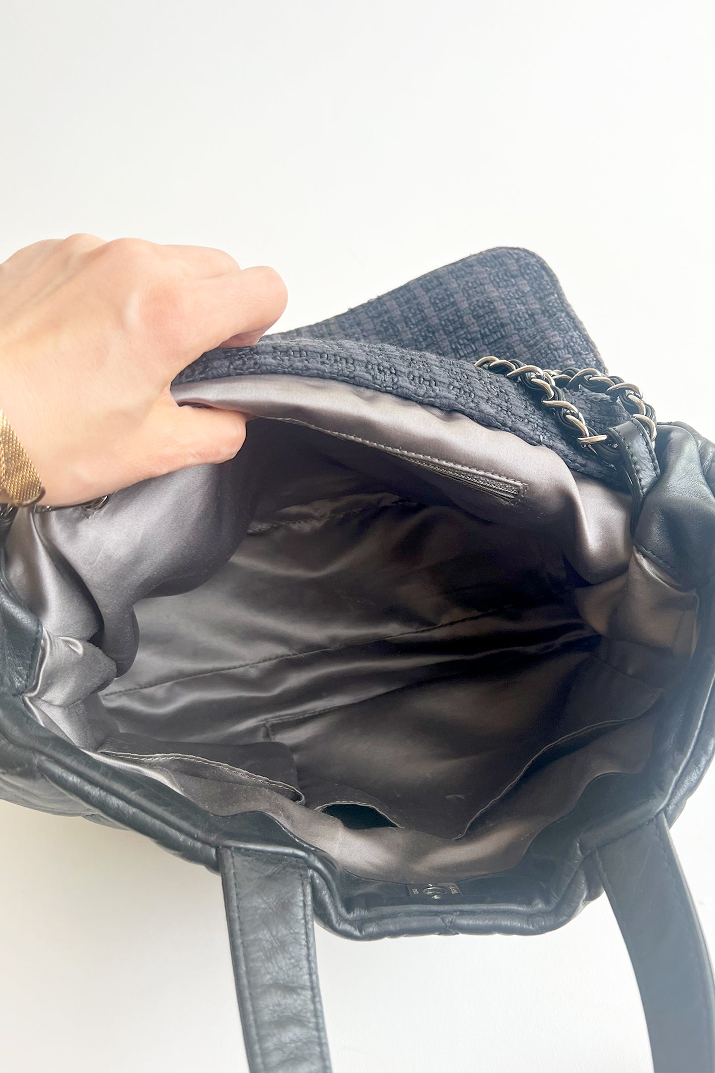 Vintage 2000s Chanel black leather two way tote with tweed flap top